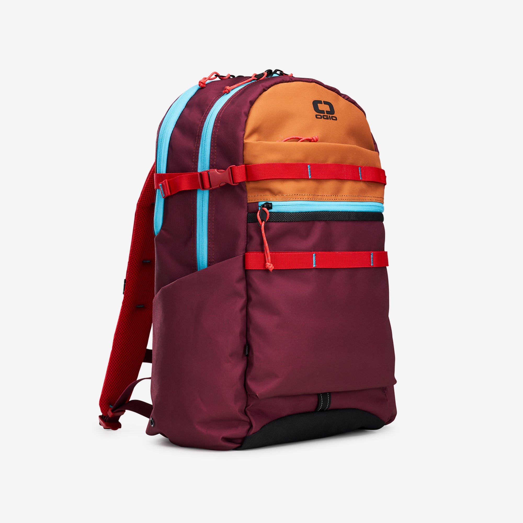 A blue and black OGIO backpack with multiple compartments and a front zipper closure.