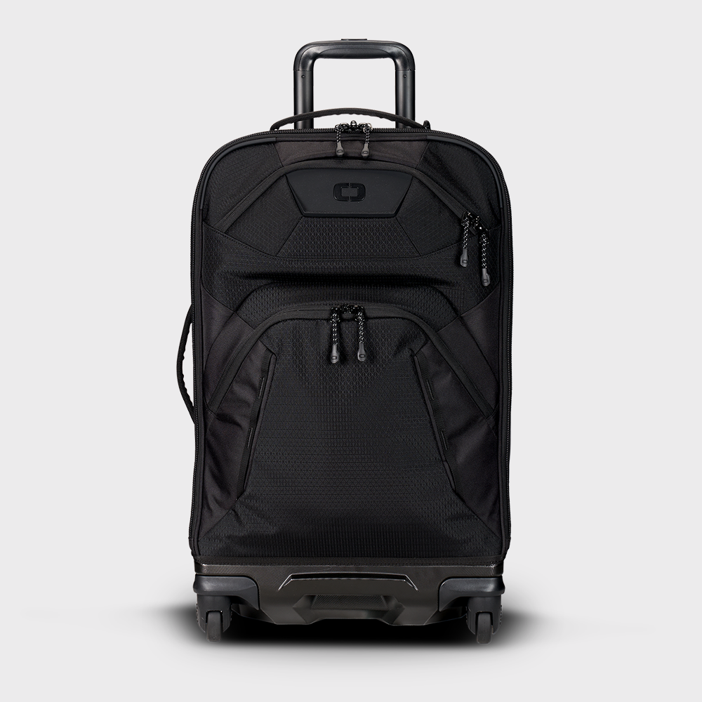 A black Renegade Pro 26‰ luggage bag with a telescoping handle, top and side carry options, and multiple compartments.