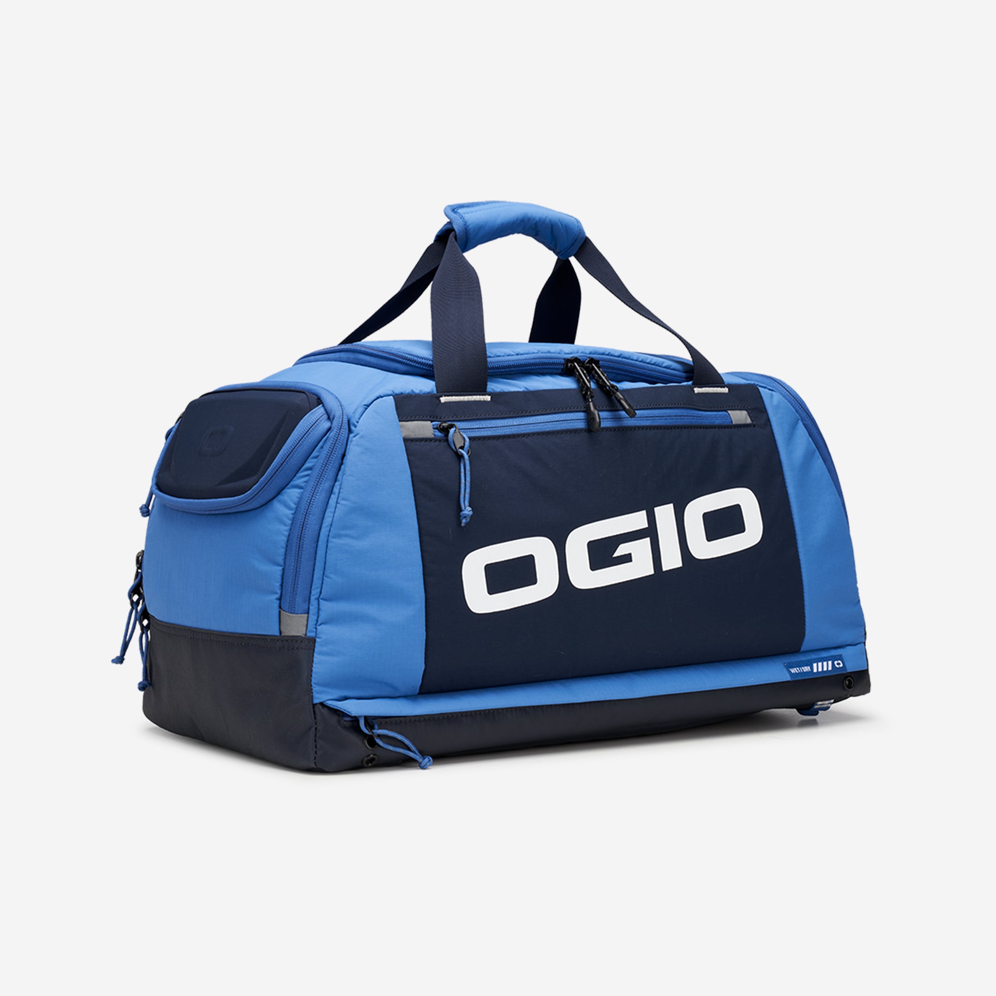 A blue and black OGIO fitness duffel bag with brand logo displayed on the side.