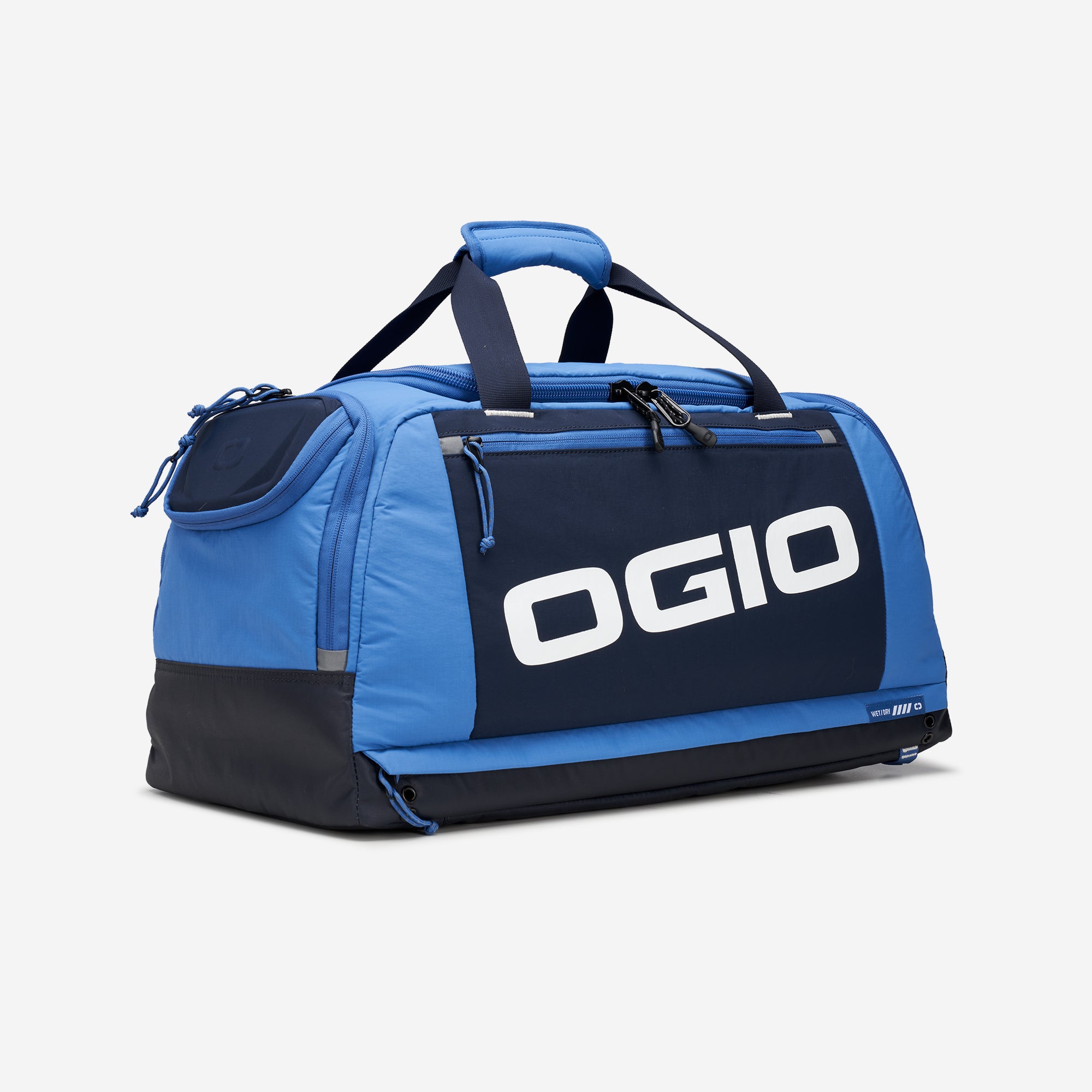 A blue duffel bag with the brand name OGIO printed on the side.