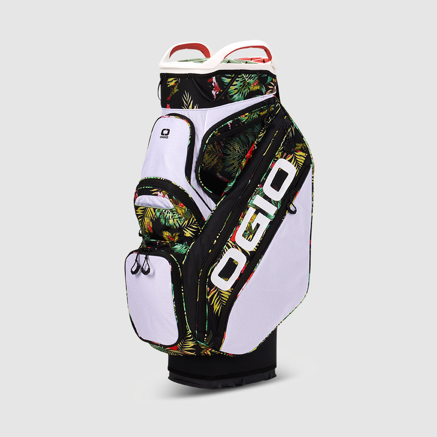 OGIO Silencer golf cart bag with a multicolor floral and geometric pattern on a white base, featuring multiple storage pockets and the OGIO logo.