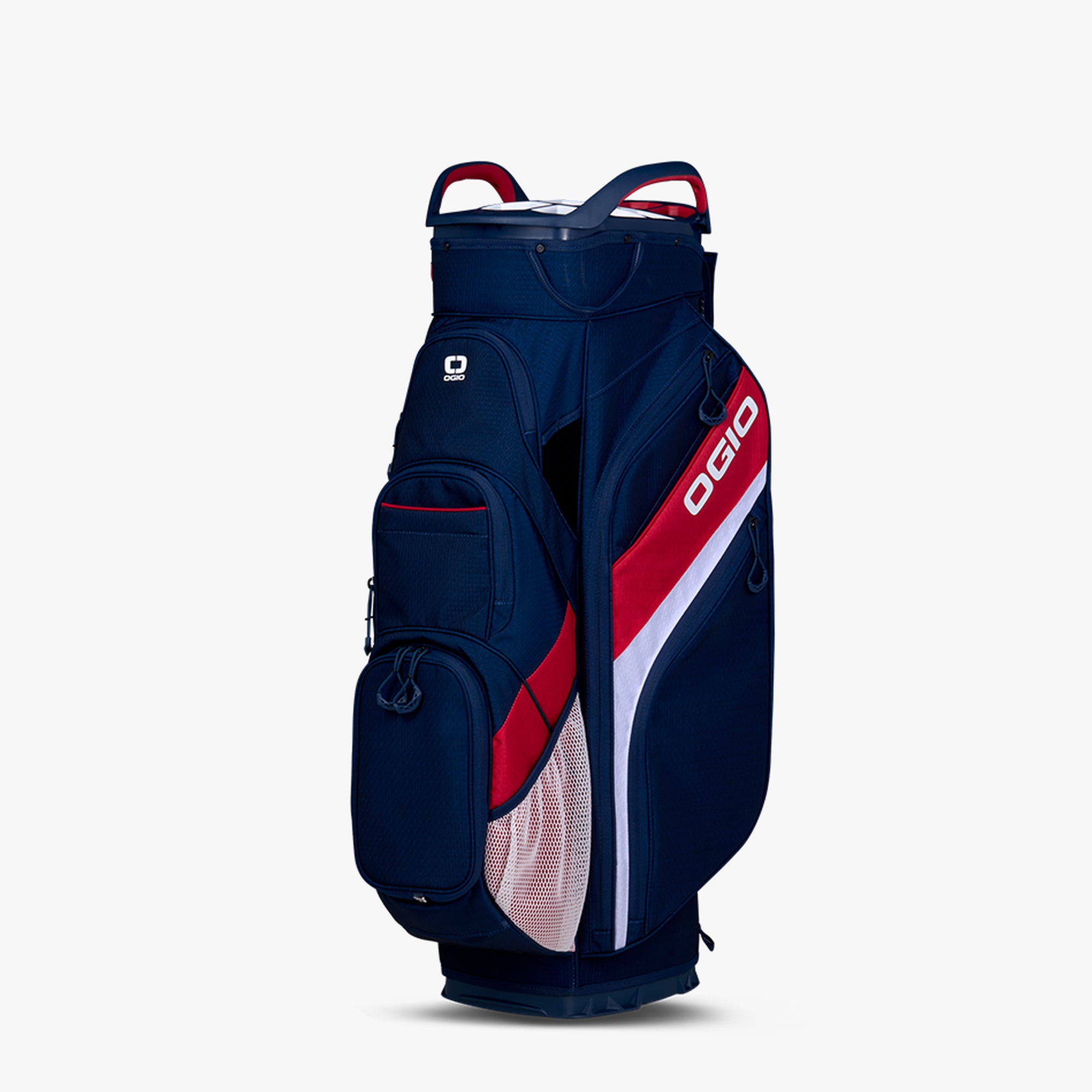 A red, white, and blue OGIO golf cart bag with multiple pockets and a vertical logo on the side.