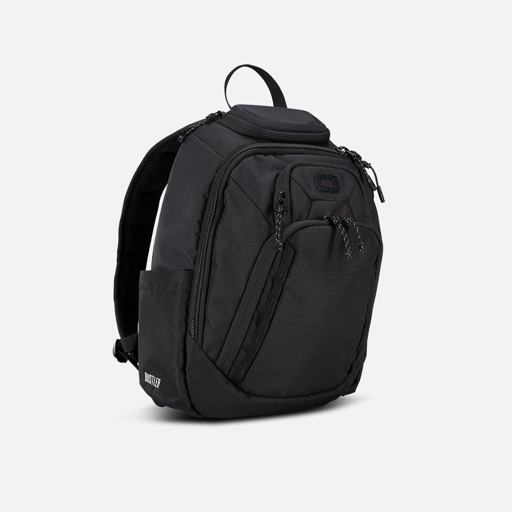 A black Renegade Rustler backpack with multiple compartments and adjustable straps, displayed against a white background.