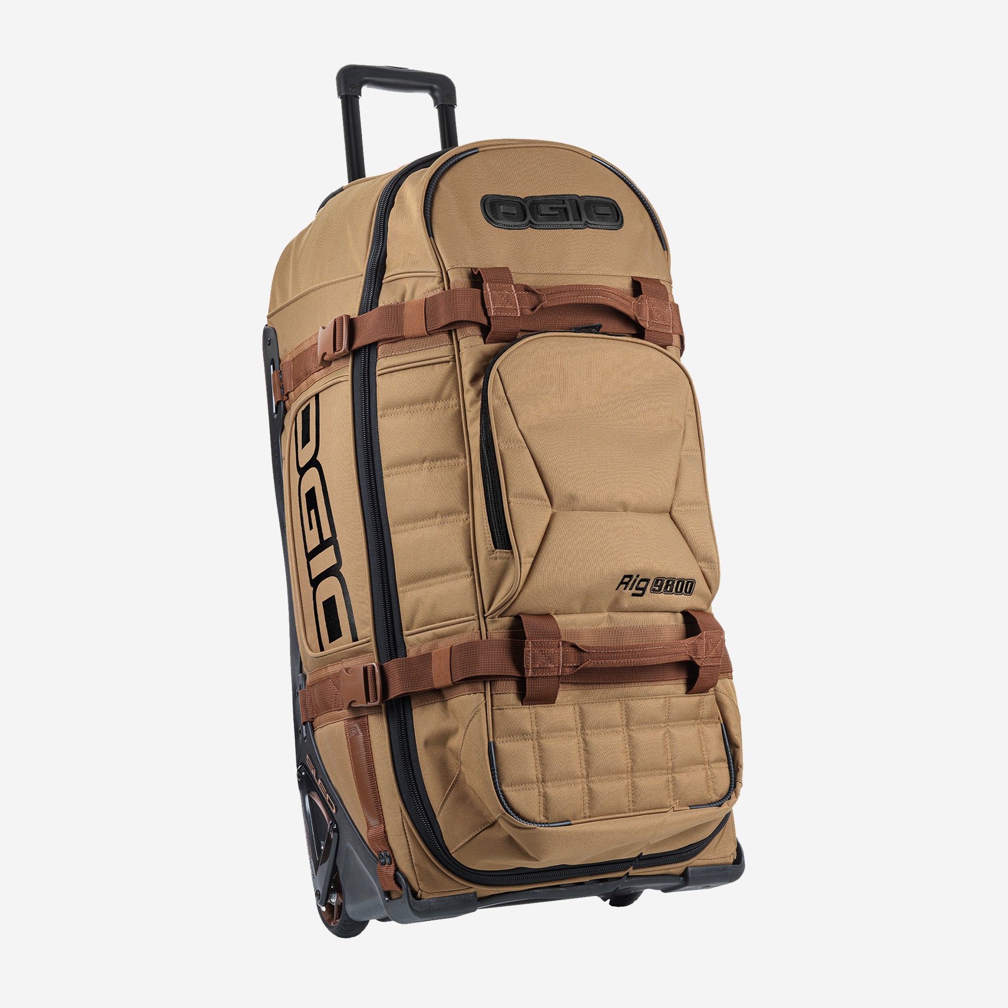 A coyote brown OGIO travel bag with multiple compartments and wheels.